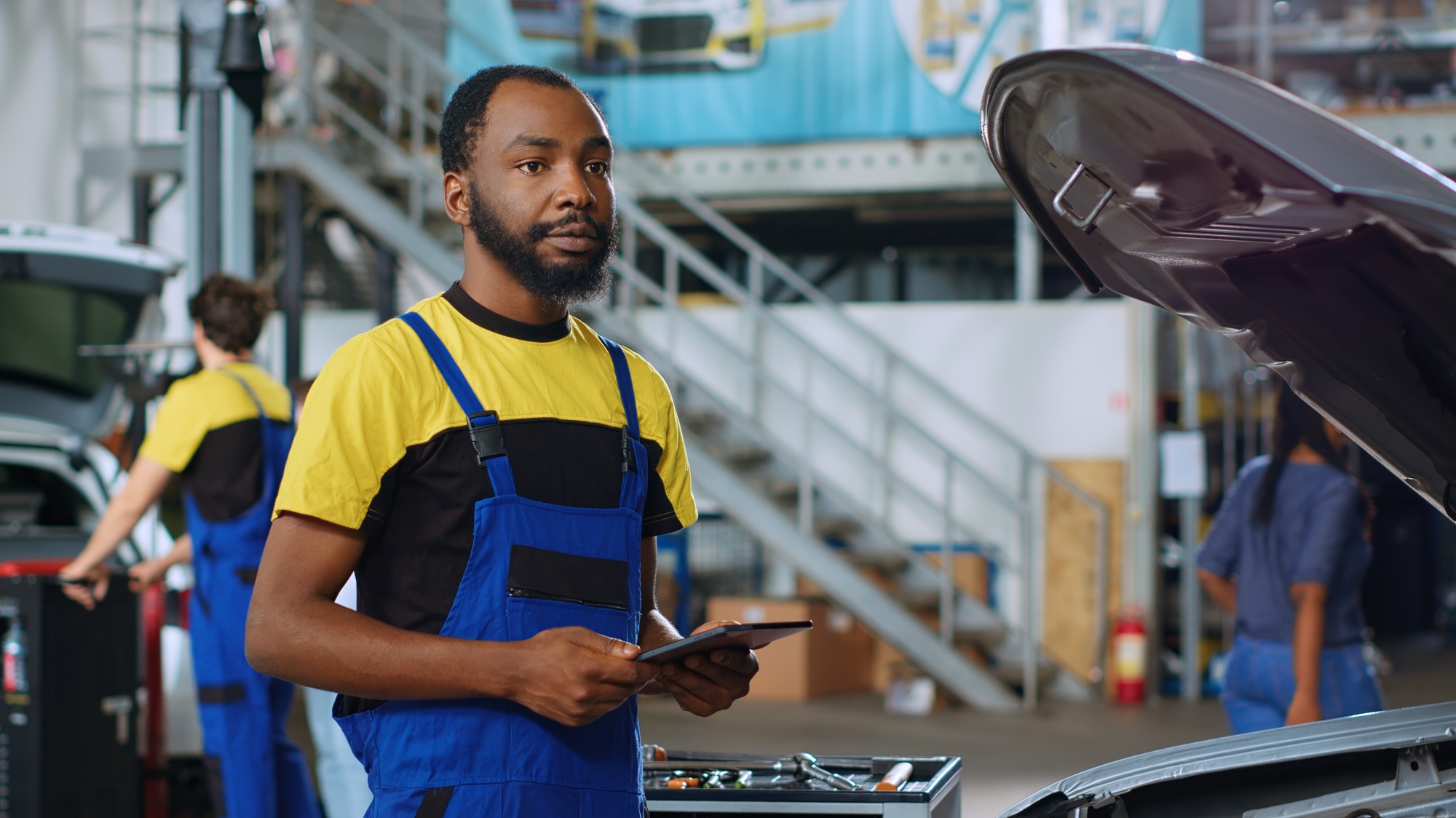 Engineer in car service orders parts